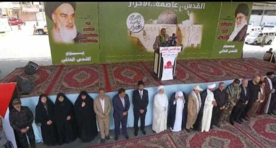 مقاتلون شيعة خلال مسيرة بمناسبة 